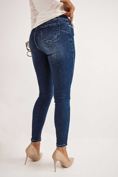 Spodnie jeansowe rurki z przetarciami In Point